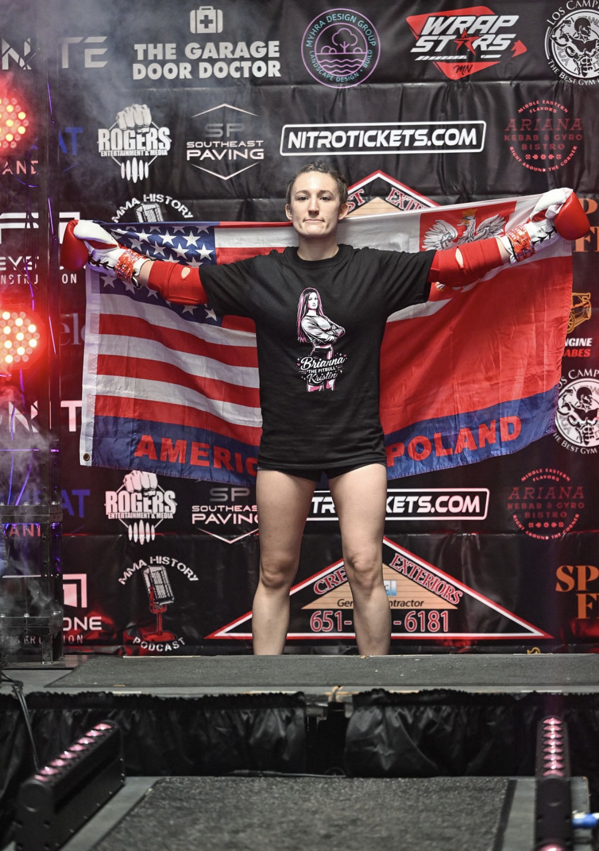 Brianna Kristin wearing her official merch tee at fight weigh-in